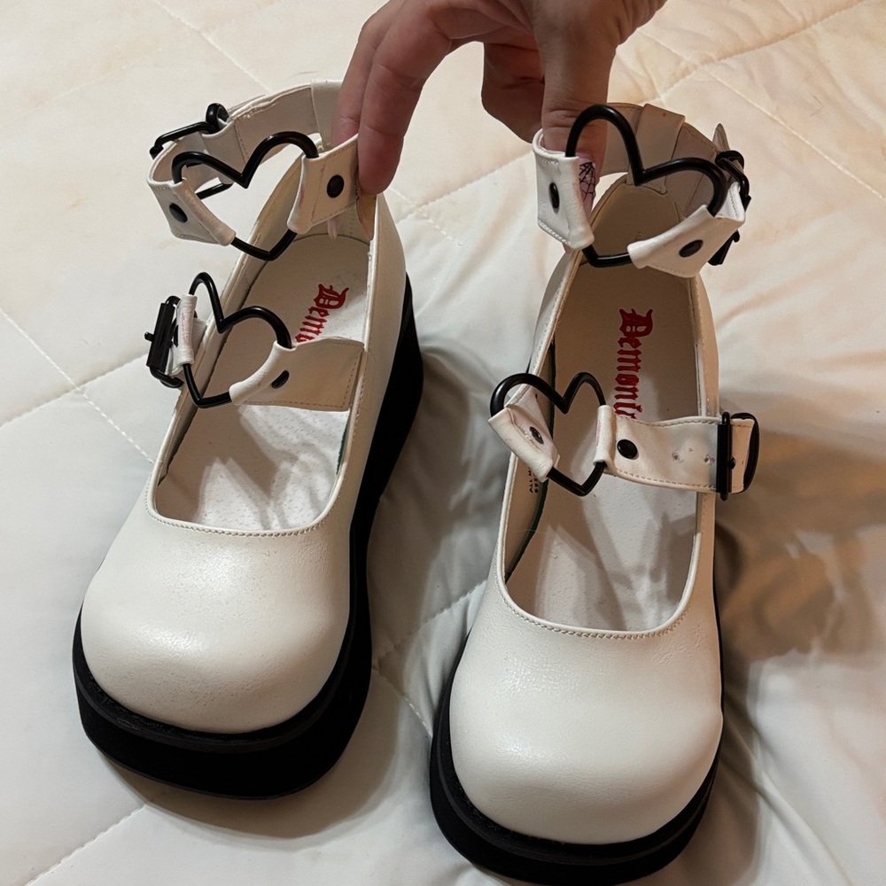 Demonia Black and White Heart Buckle Platforms